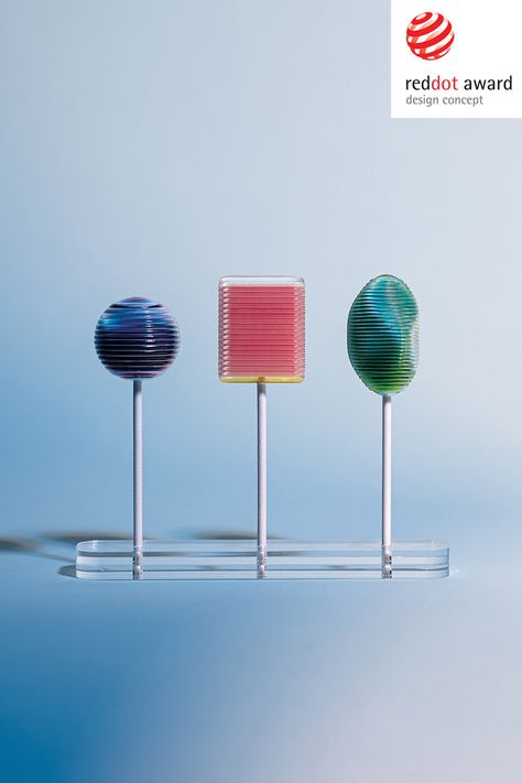 Playful Product Design, Speculative Design Products, Interactive Product Design, Olipop Branding, Tactile Exhibition, Toys Exhibition Design, Miel Pops, Lollipop Design, Product Rendering