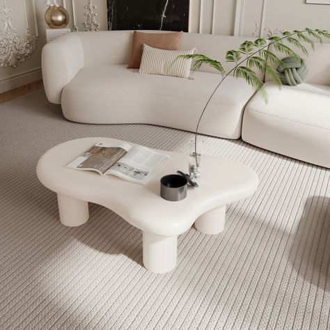 This whimsical coffee table features a unique cloud shape that adds a touch of playfulness and sophistication to your living room, bedroom, study, or balcony. Its versatile design makes it a perfect fit for various interior styles, from modern to eclectic. Crafted with precision, the table's smooth surface is ideal for displaying books, decor, or enjoying a cup of coffee. The durable construction ensures it withstands daily use, while the elegant finish adds a touch of luxury to your home. The 4 Modern Gold And White Living Room, Cloud Table Decor, Cream Room Decor, Cloud Living Room, Irregular Table, Target Side Table, Unique Coffee Table Ideas, Whimsical Coffee Table, Cute Coffee Table