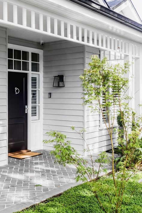 9 Hamptons homes that are timeless and classic Hampton Style Front Door, Grey Weatherboard House, Hampton Style Exterior, Under Deck Skirting, Hamptons Home Exterior, Vintage Coastal Cottage, Arch Front Door, Hampton Interior Design, Coastal Homes Exteriors