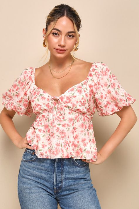 The Lulus Sunny Match Pink Floral Print Puff Sleeve Top pairs perfectly with a warm day and a picnic date in the park! Airy woven fabric, with a plaid embossed design and a cute floral print throughout, shapes this spring-ready top with a sweetheart neckline, accented by a tying keyhole detail. Short puff sleeves (with elasticized cuffs) frame the peplum-inspired silhouette that ends at a slightly cropped hem. Fit: This garment fits true to size. Length: Size medium measures 20.5" from shoulder Floral Tops Outfit, Chiffon Tops For Women Floral, Birthday Tops, Floral Top Outfit, Back To School Looks, Floral Blouses, New Style Tops, Easy Hairstyles For Thick Hair, Church Outfit