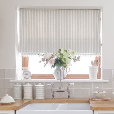 Country Blind Inspiration - Sea/Ivory Cambridge Stripe Blinds - creating the perfect laid back kitchen, perfect with ivory pom pom trim. Susie Watson Designs https://www.susiewatsondesigns.co.uk/sea-ivory-cambridge-stripe-308.html Roller Blinds Kitchen, Blinds Inspiration, Kitchen Shades, Kitchen Window Design, Susie Watson, Kitchen Window Curtains, Lovely Kitchen, Kitchen Blinds, Country Interior