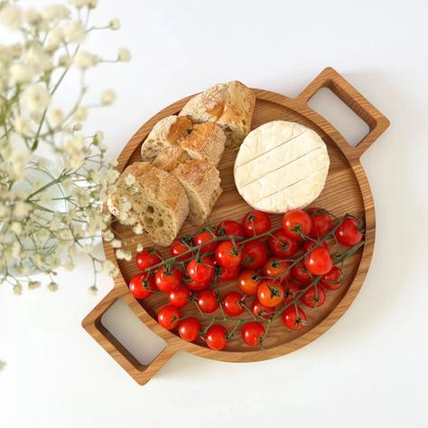 This sturdy handmade wooden tray is now available in stock 🧀 Perfect as a cheese board, fruit platter, a gift for your loved ones or as a table centrepiece to impress your guests 👌 #woodentray #traywithhandles #servingtrays #servingboards #ecofriendlyproducts #ecofriendlygifts #cheeseboardsofinstagram #cheeseboards #fruitplatter #handmadegiftideas Mineral Food, Round Wooden Tray, Cheese Lover Gifts, Rustic Serving Trays, Wooden Platters, Wood Platter, Bee Lover Gifts, Tray With Handles, Kitchen Dimensions