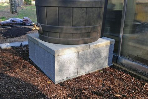 The Southern Gardener Rain Barrel Platform courtesy of http://southern-gardener.com/2017/07/diy-rain-barrel-stand/ Cinder Block Rain Barrel Stand, Diy Rain Barrel, Washer And Dryer Stand, Rain Barrel Stand, Rain Barrel System, Landscaping Patio, Barrels Diy, Cinder Block Bench, Block Bench