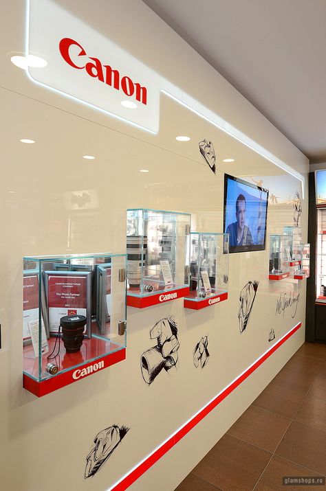 F64 photo equipment department store Bucharest 24 Camera Store Design, Canon Showroom, Internal Branding, Vitrine Design, Showroom Ideas, Banks Office, Photo Corner, Holographic Displays, Camera Store