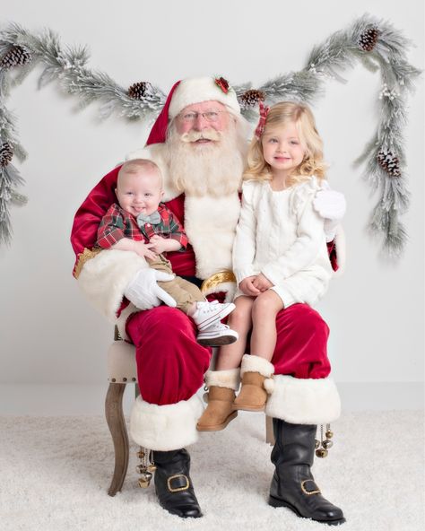 Classic Santa photos with baby and toddler! Santa Photo Set Up, Santa Christmas Photoshoot, Diy Santa Photoshoot, Sibling Santa Pictures, Baby And Santa Pictures, Family Pictures With Santa Outfits, Santa And Baby Photo Ideas, Toddler Santa Pictures, Sibling Santa Photo Outfits