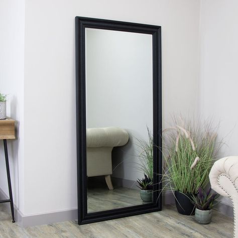 Create an eye-catching look in your home with this stunning Large Matt Black Bevelled Glass Wall Mirror 158cm x 78cm! Measuring almost 5 feet long, this stylish mirror features wood and glass construction with a deep black painted finish that adds a sense of sophistication to any space. Perfect for bedrooms, hallways or as a beautiful addition to your living room, this wall mirror's minimalist style is sure to make any area look modern and inviting. Unlike traditional rectangular mirrors, the un Black Big Mirrors, Tall Black Mirror, Mirror At End Of Hallway, Full Length Mirror Hallway, Black Mirror Decor, Black Standing Mirror, Large Black Mirror, 2023 Apartment, Black Frame Mirror