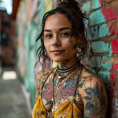 Portrait of a young woman with tattoos against a colorful graffiti wall, showcasing individuality and self-assuredness. Tattooed Black Women, Tatted Aesthetic, Tattoo Photoshoot Ideas, Tattoo Photoshoot, Art Identity, Graffiti Background, Tattooed Woman, Tattooed Girls, Henna Tattoo Designs Hand