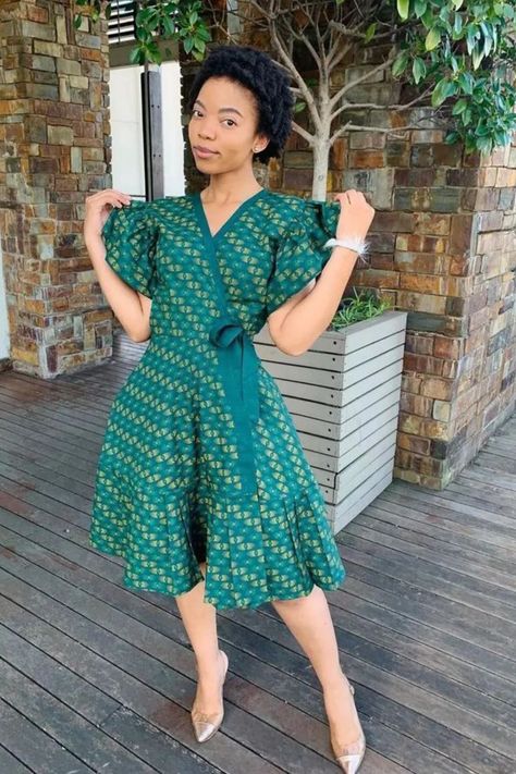 A lady wearing an Ankara wrap gown Ankara Wrap Gown Styles, Ankara Wrap Gown, Simple Ankara Dress Styles, Ankara Wrap Dress Styles, Wrap Gown Styles, Ankara Dress Styles For Ladies, Wrap Dress Ankara, Ankara Wrap Dress, Dress Styles For Ladies