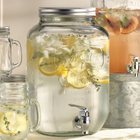 No Magnolia home is ready for the big reveal without lemonade in a pitcher like this mason jar beverage dispenser ($30). Mason Jar Drink Dispenser, Mason Jar Dispenser, Gallon Mason Jars, Mason Jar Drinks, Deep South Dish, Wine Dispenser, Make Simple Syrup, Beverage Dispenser, Beverage Dispensers