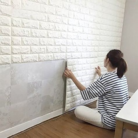 Give your home some character and add texture to your walls with peel-and-stick wall panels. 3d Brick Wall Panels, Tiles For Bedroom, 3d Brick Wall, White Brick Wallpaper, White Wall Paneling, Brick Wall Paneling, Tv Fal, Living Room Background, Diy Wallpaper