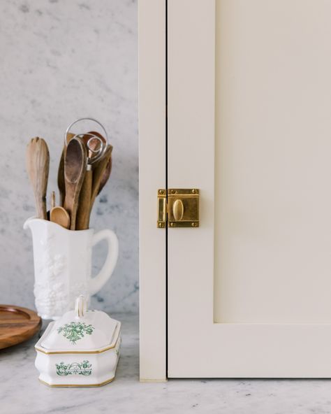 Inset storage cabinet with brass lock. Love the details. Locking Cabinet Hardware, Latch Hardware Cabinets, Brass Latch Kitchen Hardware, Cabinet Latch Hardware, Cabinet Latches, Marble Counters, Latches Hardware, Inset Cabinets, Decorating House