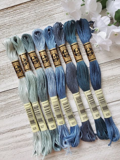 ❤ PRODUCT DETAILS ❤ DMC Set of Flosses- 8 Skeins DMC Art. 117 8 cotton skeins to inspire your next project.  Each skein measures (8m/8.7yds each) Made in France  IF WE ARE MISSING 1 SKEIN FROM THE ABOVE LIST WE WILL SEND THE CLOSEST COLOR. IF MORE THAN 1 IS MISSING YOU WILL BE CONTACTED Colors included:  924 Very Dark Green Gray 926  Medium Green Gray 927 Light Beige Gray 928 Very Light Beige Brown 930 Medium Antique Blue  931 Medium Antique Blue 932 Ultra Very Light Antique Blue 3768 Dark Beige Dmc Color Palette Embroidery, Dmc Floss Chart, Embroidery Floss Crafts, Very Dark Green, Yarn Color Combinations, Cross Stitch Floss, Dmc Embroidery, Cross Stitch Thread, Friendship Bracelets Designs