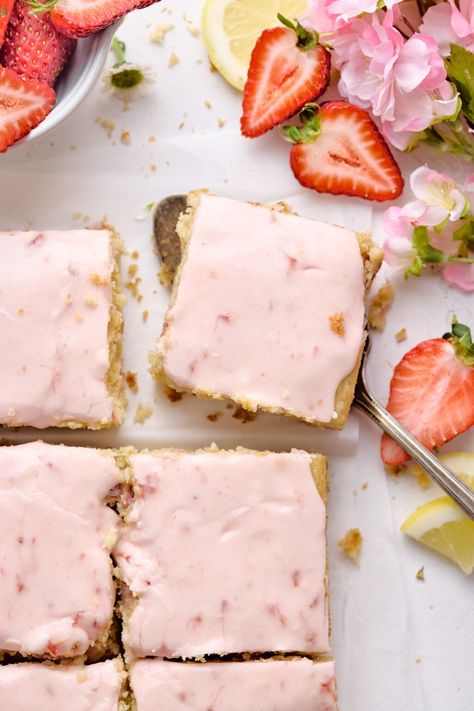 Easy, delicious strawberry lemon blondies made with a gluten-free blondie base flavored with fresh strawberries and lemons, then topped with a sweet pretty pink glaze. Lemon Blondies Recipe, Strawberry Lemon Blondies, Lemon Blondies, Strawberry Gluten Free, Dairy Free Frosting, Strawberry Brownies, Gluten Free Brands, Dairy Free Cream, Gluten Free Cupcakes