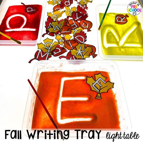 Fall writing trays plus Fall Light Table Activities designed for preschool, pre-k, and kindergarten students to learn and develop in a hands-on way. Pre Fall Activities, Creative Writing Preschool, Fall Literacy Activities For Toddlers, October Literacy Activities Preschool, Fall Hands On Activities, Writing Table Preschool Ideas, Apple Light Table Activities, Letter Recognition Activities Preschool Center Ideas, November Light Table Ideas