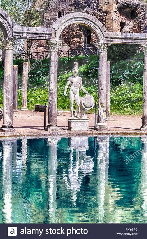 Download this stock image: Greek statue of Ares overlooking the ancient pool called Canopus, inside Villa Adriana (Hadrian's Villa), Tivoli, Italy - PKYGPC from Alamy's library of millions of high resolution stock photos, illustrations and vectors. Ancient Greek Garden, Greek Pool, Hadrian's Villa, Ancient Greece Aesthetic, Ancient Garden, Tivoli Italy, African Drawings, Greek Garden, Roman Garden