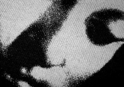 Close-up of a discharged print on a black shirt. Note that you can still see the fibers of the shirt. Our discharge inks leave nothing on the shirt once they're washed, so they're soft and they breathe, which is especially nice here in the Sonoran Desert. Discharge Printing, Screen Printing Techniques, Sonoran Desert, Art Plastique, Textile Prints, Printing Techniques, Superhero Logos, A Black, Black Shirt