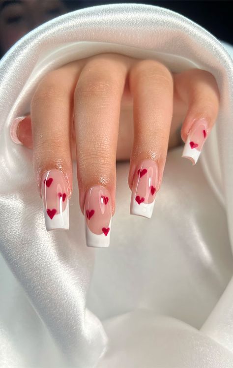 Valentine's Day nails, Romantic nail designs, Love-themed nail art, Heart-shaped nail patterns, Cupid-inspired nail ideas, Red and pink Valentine nails, Date night manicure, Valentine's Day acrylic nails, Romantic nail color trends, Love letter nail art, Heartfelt Valentine's nails, Sweetheart nail designs, Couples manicure ideas, Valentine's Day beauty trends, Love-inspired nail aesthetics Valentines Day Nails Cupid, Red Nails With Hearts Valentines, Valentines Themed Nails, Cupid Nails Designs, Red And Pink Nails Valentines Day, Valentine’s Day Nails Red, Red Valentine’s Day Nails, Couples Manicure, Love Letter Nails