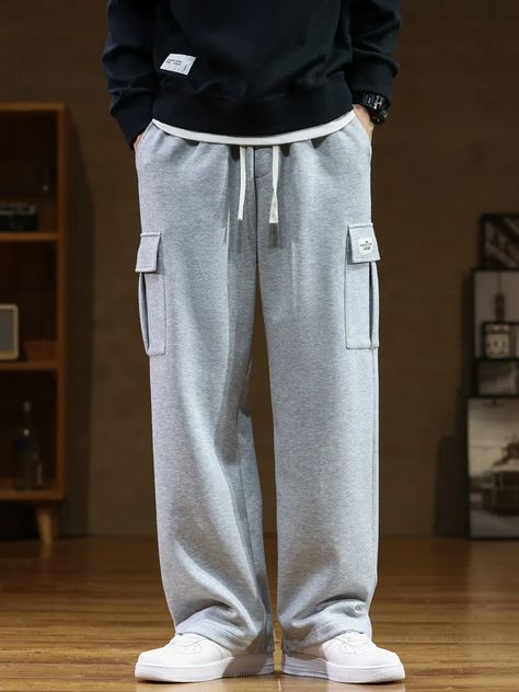 Experience the comfortable feel of our Loose Fit Polyester and Cotton Multi Pocket Baggy Sweatpants! Relax and be stylish all at once! DETAILSFit Type: LooseMaterial: Polyester, Cotton Loose Sweatpants, Pocket Sweatpants, Casual Pants Style, Baggy Sweatpants, Korean Streetwear, Loose Fabric, Track Pant, Casual Sportswear, Straight Trousers