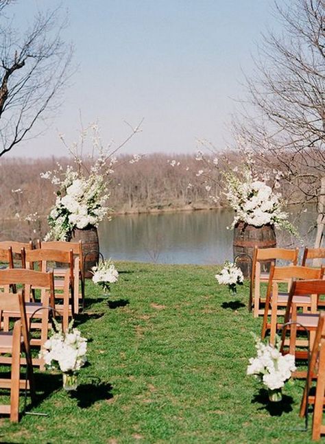 white cherry blossom wedding decor / http://www.himisspuff.com/rustic-country-wine-barrel-wedding-ideas/7/ Lake Wedding Ceremony Decor, Wine Barrel Wedding Ceremony, River Wedding Ideas, Driftwood Arch, Wine Barrel Wedding, Barrel Wedding, Wedding Alters, Flowers Wine, River Wedding