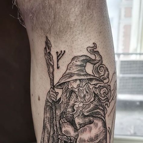 ✥ᴀᴍʙᴇʀ ɪᴅᴀ✥ on Instagram: "Another shot of Gandalf I did on Casey, other leg tattoo done by amazing James hate. If you would like to book in the send me a message to amberida.tattoo@gmail.com 🖤 @higginsandco . . . . . #engraversart #engravertattoos #blacktattooing #etchingtattoo #illustrationtattoo #lineworktattoo #etching #woodcut #woodcuttattoo #illustrativetattoo #occult #occulttattoo  #folklore #engraving #esotericart #lordoftheringstattoo #lotrtattoo #gandalftattoo #medievaltattoo #eastbo Woodblock Tattoo Style, Medieval Etching Tattoo, Arthurian Tattoo, Wood Etching Tattoo, Engraving Tattoo Design, Woodcut Tattoo Design, Woodcut Tattoo Sleeve, Medieval Tattoo Sleeve, Engraving Style Tattoo