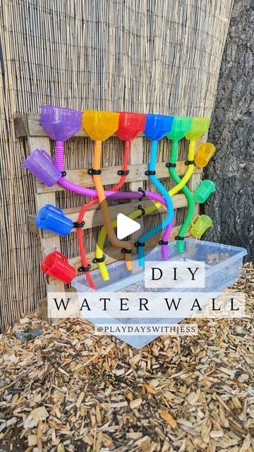 Sensory Fence Ideas, Outdoor Sensory Wall Fence, Backyard Water Play Ideas, Kids Outdoor Water Play Area Ideas, Outside Eyfs Ideas, Outdoors Eyfs Ideas, Pallet Water Wall Kids, Outdoor Play And Learning, Diy Water Play For Kids