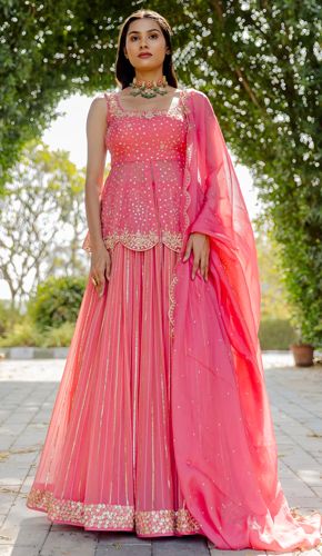 Pretty in Pink: Stylish & Trending Pink Color Dresses | WIFD Lehenga Designs For Sangeet, Peplum Blouse Indian Lehenga, Lehanga Blouses, Peplum Top Lehenga, Outfit From Scratch, Top And Lehenga, Peplum Top Outfits, Top Lehenga, Pink Colour Dress