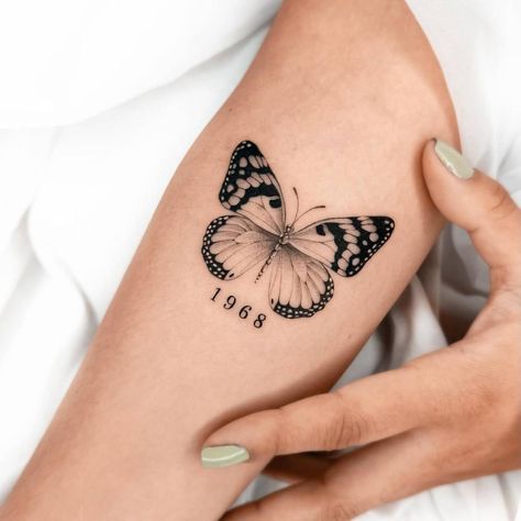 11:11 Tattoo With Butterfly, Butterfly With Marigold Tattoo, Butterfly Tattoo With Birth Year, Butterfly And Year Tattoo, Birth Year Butterfly Tattoo, Butterfly Birth Year Tattoo, Butterfly And Date Tattoo, Butterfly Tattoo With Year, Butterfly Gemini Tattoo