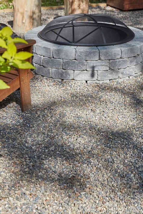 A pea gravel patio is easy and inexpensive to build. Learn how to create a pea gravel patio for your yard that is easy to maintain. #outdoordecor #patioideas #backyarddecorideas #backyardpatioideas #homedecorideas #thespruce Pea Gravel Yard, Gravel Yard, Pea Gravel Patio, Gravel Patio, Pea Gravel, English Country Gardens, Modern Cottage, French Garden, Fire Pit Backyard