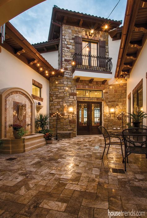 Globe lights over this home patio create a Tuscan-inspired getaway. See all our globe lights: http://www.lightsforalloccasions.com/c-245-globe-string-lights.aspx Asma Kat, Casa Country, Tuscan Inspired, Casas The Sims 4, Tuscan House, Casas Coloniales, Spanish Style Homes, Front Entrance, Spanish House