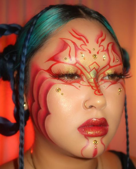 year of the dragon 🐉🧧✨ heavily inspired by @chilli0il art 🫶🏼 @milkmakeup hydrogrip primer, stoked contour stick @hudabeautyshop pink pomelo faux filter under eye corrector, cherry blossom easy bake powder @aboutfacebeauty LM2 Olive performer foundation, art of darkness eye paint @gavissibeauty tokyo duochrome eyeshadow @bymelolops moves matte water ink @halfmagicbeauty bold metallic face pearls @maccosmetics poncy locked kiss lipstick @queencosmeticsstore angel gloss . . #dragon #dragonmake... Red Mermaid Makeup, Red Dragon Makeup, Dragon Makeup Look, Face Pearls, Under Eye Corrector, Eye Corrector, Dragon Makeup, Duochrome Eyeshadow, Kiss Lipstick