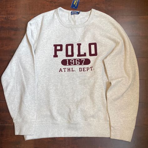 New Men’s Polo Ralph Lauren Sweatshirt. Sizes Xl And Xxl. Color Is Heather Gray. Crew Neck. Long-Sleeve. Dark Red/Maroon “Polo 1967 Athl. Dept.” Felt Logo On Front. 60% Cotton, 40% Polyester. Imported. Measures Xl: 34”Sleeve, 9” Neck Width, 20” Shoulder Width, 19” Inseam, 22” Waist, 26.5” Chest, 29.5” Full Length, 4.75” L X 2.75” H Cuff; Xxl: 34.5” Sleeve, 10” Neck Width, 20” Shoulder Width, 20” Inseam, 24.5” Waist, 28” Chest, 30.5” Full Length, 4.75” L X 2.75” H Cuff. Original Tags Attached. Ra Printed Sweatshirts Mens, Crewnecks Men, Ralph Lauren Fits, Ralph Lauren Shirts Men, Sweatshirts Aesthetic, Dark Red Maroon, Polo Ralph Lauren Hoodie, Men Crewneck, Ralph Lauren Fleece