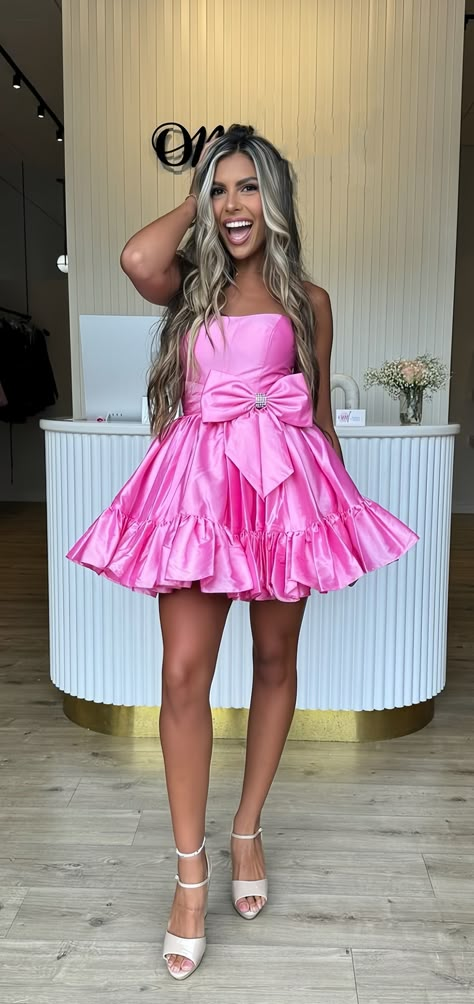 Get ready to turn heads at your next homecoming event with our Strapless Pink A-Line dress! Featuring a flattering A-line shape and a cute bowknot detail, you'll feel confident and elegant all night long. The strapless style adds a touch of femininity, making this dress a must-have for any special occasion. Dress DetailStyle: A-LineFabric: SatinColor: PinkLength: MiniNeckline: BoatSleeves: Sleeveless Pageant Dresses For Women, Barbie Pageant, Pink A Line Dress, Hoco Inspo, Homecoming Dresses For Teens, Sequin Homecoming Dress, Cute Homecoming Dresses, Tulle Homecoming Dress, Dress Tight