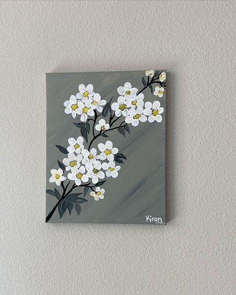 white flower with stem with smear of grey in background brings out beautiful look on this acrylic painting on canvas. Painting On Grey Background, Flower Easy Painting Simple, White Painting Ideas On Canvas, Simple Canvas Art Painting, Grey Acrylic Painting Ideas, Simple Art Painting Ideas Beautiful, Grey Background Painting Ideas, White Flower Canvas Painting, Canvas Painting Background Ideas Easy Diy