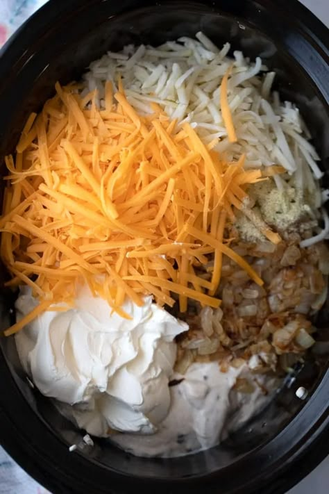 Crockpot Cheesy Potatoes Recipe | The Carefree Kitchen Easy Crockpot Potatoes, Potato Hashbrown, Cheese Hashbrowns, Cheesy Potatoes With Hashbrowns, Crockpot Potatoes, Cheesy Potatoes Crock Pot, Cheesy Potatoes Recipe, Slow Cooker Potatoes, Crock Pot Potatoes