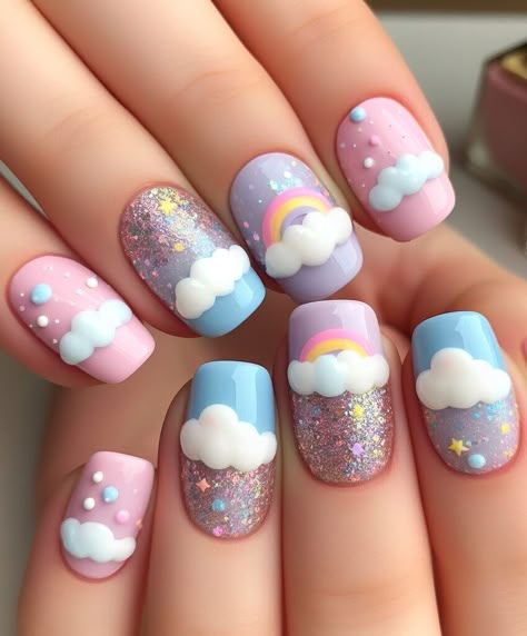 Minimalist magic with shine! ✨ Elevate your cloud and rainbow design with a touch of glitter. Add a delicate shimmer to the base coat or a single line of glitter outlining the clouds for a modern and chic look. Nail Art Designs 2024 Difficult Nail Art Designs, Kid Rainbow Nails, Pastel Nail Art Designs, Clouds Nails, Baby Nail Art, Paw Print Nails, Rainbow Nail Art Designs, Cloud And Rainbow, Unicorn Nail Art