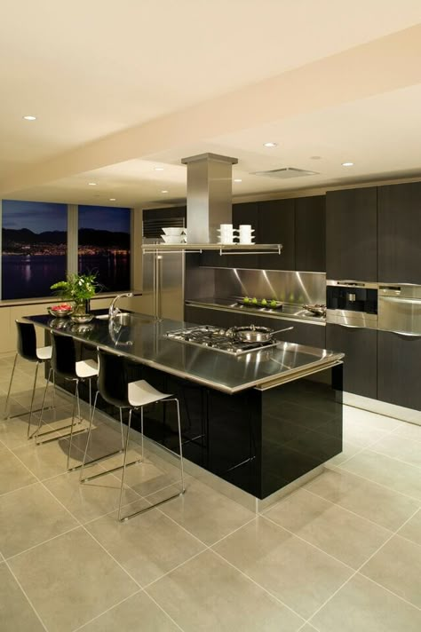 Modern Kitchen Island Design, Island With Stove, Kitchen Island With Stove, Ultra Modern Kitchen, Unique Kitchen Design, Modern Kitchen Island, Black Kitchen Cabinets, Contemporary Kitchen Design, Kitchen Island Design