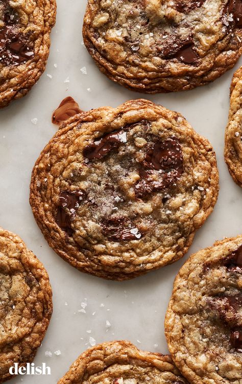 If you've been wondering what to bake with bananas and chocolate chips, we've got the answer: banana chocolate chip cookies. They're perfectly chewy on the interior with just-right crispy edges, and are packed with puddles of gooey chocolate and delicious banana flavor. Bake With Bananas, What To Bake, Banana Pudding Cookies, Banoffee Pie Recipe, Banana Pudding Poke Cake, Banana Chocolate Chip Cookies, Chocolate Covered Bananas, Banana Oatmeal Cookies, Banana Cookies