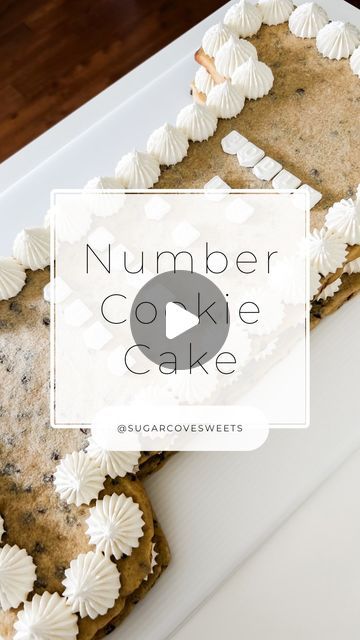 Sugar Cove Sweets by Brittany Bolus on Instagram: "N u m b e r  C o o k i e  C a k e   This is the first time I made a number cookie cake and I love how it turned out 🥹🤍  I’ll be posting how I made the number one template as well!   I made 2 layers of cookie cake and piped buttercream between the layers! The key to this technique is to use a no-spread cookie recipe! The one I use is below ☺️  R e c i p e :  2 sticks SALTED butter (cold) 100 grams granulated sugar  213 grams brown sugar  1 egg 2 tsp vanilla extract 310-360 grams all purpose flour 1 tsp corn starch 1 tsp baking powder  1/2 tsp salt (heaping) 1/2 cup chocolate chips   -Preheat oven to 375F -Mix together flour, cornstarch, baking powder, and salt in a bowl.  -Add butter, granulated sugar, and brown sugar to stand mixer and m Number Cookie Cake Recipe, Number 1 Cookie Cake, Cookie Cake Number Cakes, Number Cookies Decorated, Cookie Cake Number, Cookie Number Cake, Number Cookie Cake, Cookie Cake Decorating Ideas, Number Cookies