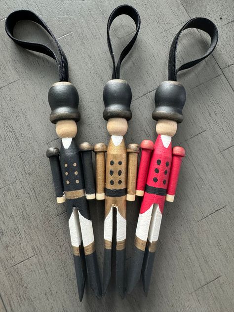 Wooden Soldier Ornament – Bohemian Bee Old Clothespin Crafts Christmas, Old Clothes Pin Crafts, Old Clothes Pins Ideas, Dough Art Ornaments, Clothespin People Ornaments, Christmas Pins Diy Craft Ideas, Clothes Pin Christmas Ornaments Diy, Christmas Clothes Pin Crafts, Peg Doll Crafts