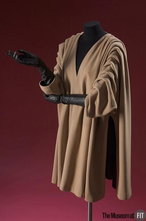 Cristobal Balenciaga. Coat, Fall 1950. Beige wool duvetyn. Gift of Doris Duke. Object Number: 72.81.23. ©2010 Fashion Institute of Technology Balenciaga Coat, Vintage Balenciaga, Mode Abayas, Cristobal Balenciaga, Cristóbal Balenciaga, Amazing Shoes, Elegant Coats, Fashion 1950s, Fashion Institute