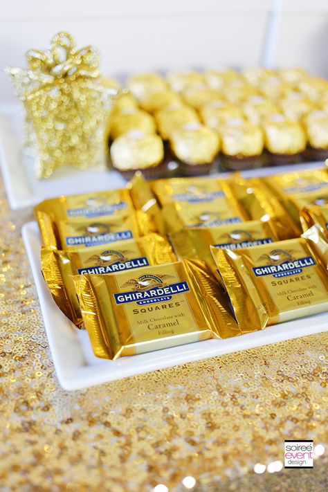 Gold And Silver Candy Table, White And Gold Party Favors, Orange And Gold Dessert Table, Golden Party Favors, Golden Birthday Appetizers, Christmas Party Candy Table, Gold Snacks For Party, 25th Golden Birthday Ideas For Him, Gold Party Favors For Adults