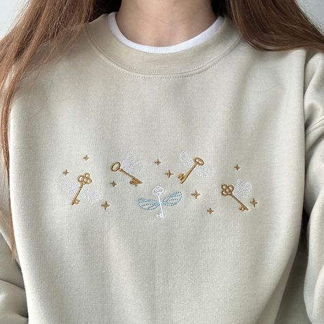 Embroidered Sweatshirt Flying Keys, Custom Embroidered Shirt, Book Sweatshirt, Bookish Sweatshirt, Fantasy Sweatshirt, Wizard Sweatshirt - Etsy Flying Keys, Cloud Craft, Harry Potter Sweatshirt, Cute Embroidery, Embroidery Sweatshirt, Embroidered Crewneck, Newborn Crochet, Embroidered Sweatshirt, Appliqué Patch