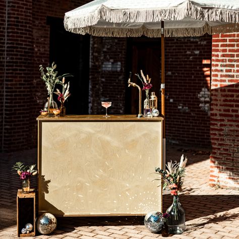 Meet Ruby – our elegant white and gold indoor bar cart that adds a touch of sophistication to any event. With polished gold accents and a sleek white finish, she’s a showstopper! Perfect for corporate events or intimate gatherings, Ruby brings style and luxury to any occasion. ✨🍸  #baltimore #maryland #mobilebar #rig #cocktails #mocktails #mobilebartending #mobilebartender Event Cocktails, Indoor Bar, Branding Ideas, Mobile Bar, Baltimore Maryland, Mocktails, Bar Cart, Corporate Events, Gold Accents