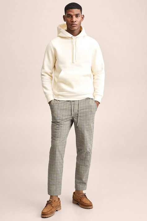 Men's small check pants, white hoodie and boat shoes preppy streetwearoutfit. This outfit first appeared in the article: Men’s Plaid Pants Outfit Inspiration: 13 Ways To Wear Them In 2022, on MensFlair.com Gray Plaid Pants Outfit Men, Men In Plaid Pants, Mens Check Trousers Outfit, Plaid Pants Outfits, Boat Shoes Outfit Mens, Plaid Pants Men Outfit Street Styles, Plaid Pajama Pants Outfits Men, Men’s Plaid Pants Outfit, Shoes Preppy