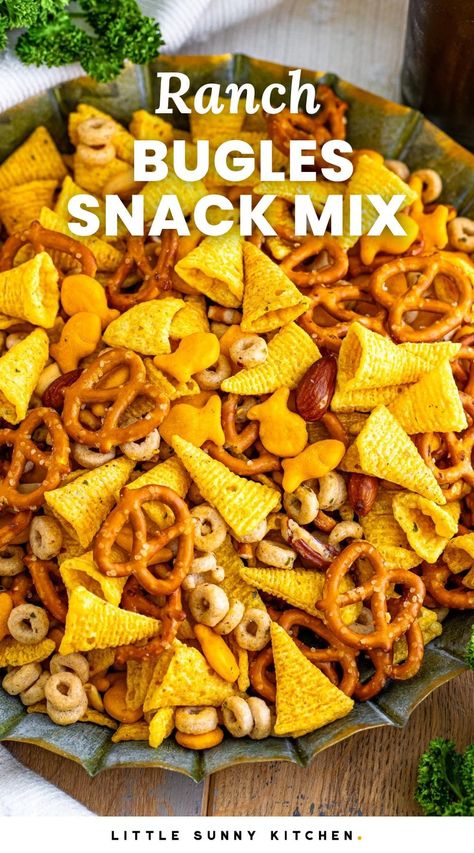 This easy and super tasty Ranch Bugles Snack Mix is the perfect party mix! It's buttery, salty, with a hint of sweet, and totally irresistible. Ranch Bugles, Bugles Snack Mix Recipes, Bugles Snack Mix, Salty Party Snacks, Ranch Chex Mix, Homemade Ranch Dressing Mix, Party Mix Recipe, Party Mix Snacks, Chex Mix Puppy Chow