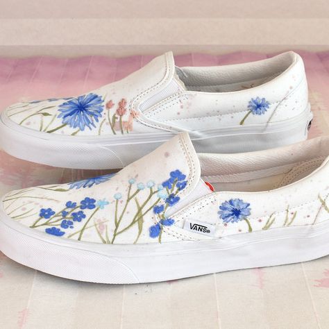 Hand painted Vans Classic slip ons, with embroidered details. A bride-to-be asked me to paint these in her wedding color palette, and I'm so grateful that she did 😊🙏 People usually ask me to paint most of the available area - these are more minimal, with a clean look. I love how they turned out 😍. What do you prefer? A mostly minimal aesthetic, or a fuller maximalist one? Let me know in the comments 🌸 #customsneakers #weddingsneakers #somethingblue #customvans #handpaintedshoes #paintedvans Bride Vans, Painted Vans Slip On, Hand Painted Vans, Embroidered Vans, Vans Classic Slip, Painted Vans, Wedding Sneakers, Hand Painted Shoes, Minimal Aesthetic