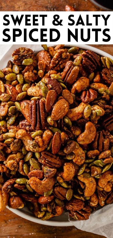 This savory rosemary spiced nuts recipe is the perfect anytime snack or appetizer. The mix of almonds, pecans, cashews, pistachios and pumpkin seeds are crunchy, salty, savory, sweet and even a little spicy. They’ve got it all! Sweet And Spicy Almonds Recipe, Mix Nuts Recipes, Spiced Nuts Christmas, Spicy Nuts Recipe Holidays, Seasoned Nuts Recipe Savory, Spiced Nuts Recipe Holidays, Spiced Nuts Recipe Savory, Roasted Nuts Recipe Savory, Seasoned Nuts Recipe