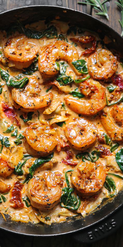 Tuscan Shrimp with Spinach, Artichokes, Sun-Dried Tomatoes - in a cast iron skillet. Smoked Seafood, Shrimp And Spinach, Tuscan Shrimp, Shrimp Recipes For Dinner, Shrimp Recipes Easy, Shrimp Dishes, Health Dinner Recipes, Seafood Dinner, Mediterranean Diet Recipes