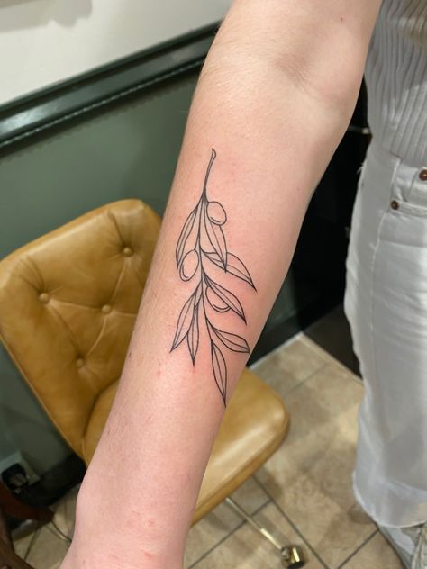 Cross Olive Branch Tattoo, Olive Branch Tattoo Upper Arm, Plant Forearm Tattoo, Branch Tattoo Arm, Olive Branch Tattoo Forearm, Olive Tree Branch Tattoo, Olive Branch Tattoo Linework, Olive Branch Arm Tattoo, Olive Branch Tattoo Arm Wrap Simple