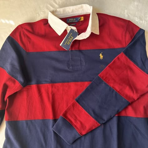 Elevate Your Wardrobe With This Classic Polo Ralph Lauren Striped Rugby Shirt. Made For Men With A Size Xl And A Regular Fit, This Shirt Features A Stylish Striped Pattern In Navy, Red And Maroon Colors That Will Surely Catch Anyone's Attention. The Fabric Wash Is Medium, Making It Comfortable To Wear During Any Activity Or Performance. This Polo Shirt Is Perfect For Any Occasion, Whether It Be A Casual Day Out Or A Game Of Rugby With Friends. Its Timeless Design And High-Quality Fabric Make It Custom Fitted Hats, Ralph Lauren Rugby Shirt, Polo Rugby Shirt, Ralph Lauren Polo Shirts, Striped Polo Shirt, Red Maroon, Plaid Shorts, Rugby Shirt, Ralph Lauren Shirt